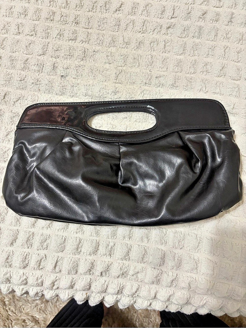 B. Bag Black Handled Clutch
